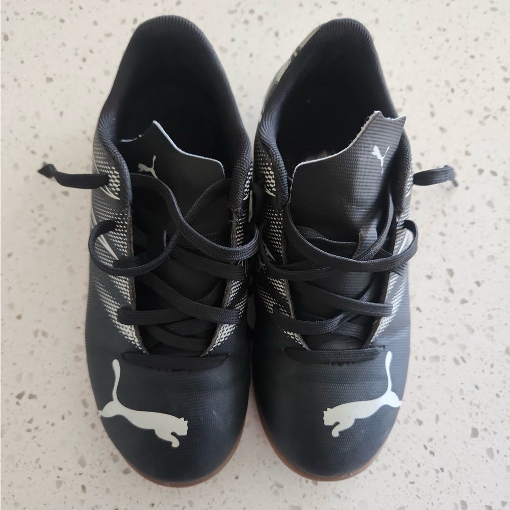 Puma Kids Black and White indoor soccer shoes